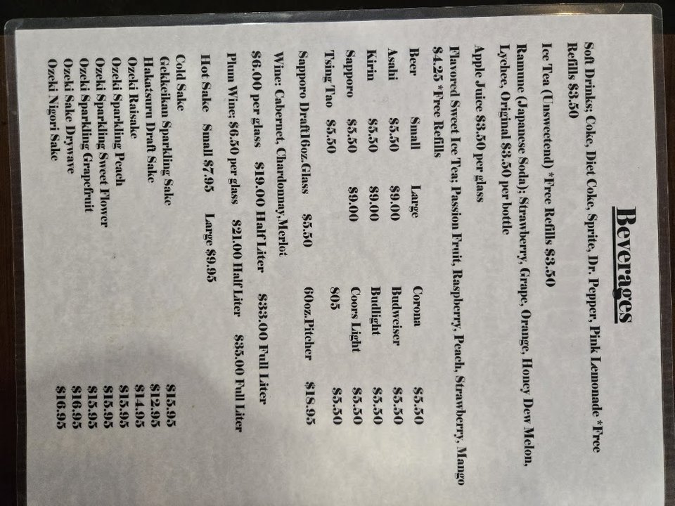 Menu page with sushi rolls listed.
