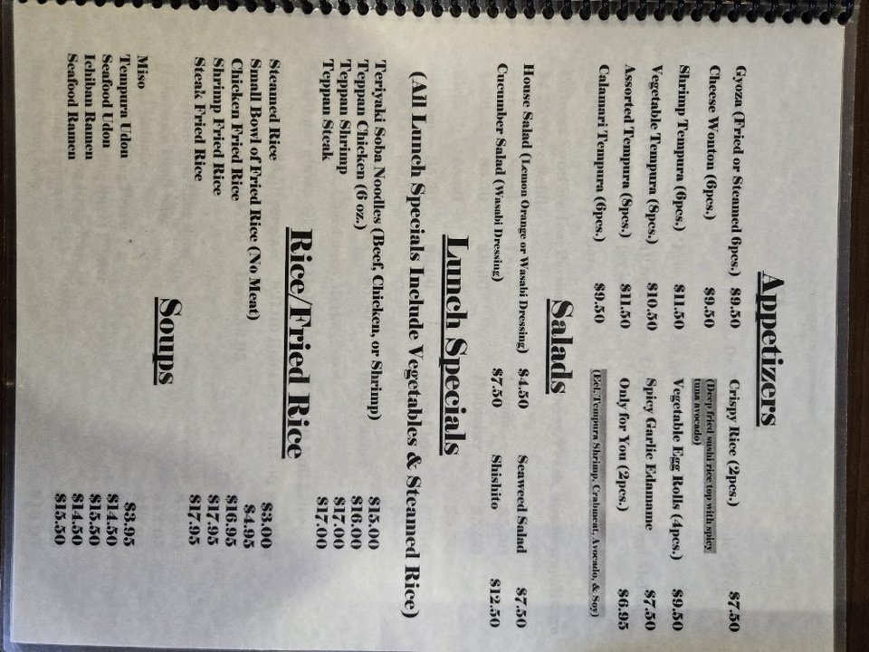 Japanese menu with rolls and specials.